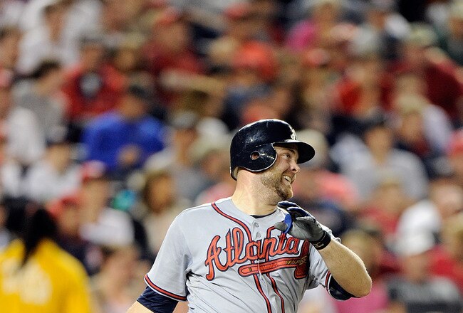 WASHINGTON, DC - SEPTEMBER 23:  Brian McCann #16 of the Atlanta Braves hits a double in the fifth inning against the Washington Nationals at Nationals Park on September 23, 2011 in Washington, DC. Atlanta won the game 7-4.  (Photo by Greg Fiume/Getty Images)