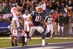 INDIANAPOLIS, IN - FEBRUARY 05:  Aaron Hernandez #81 of the New England Patriots celebrates after catching a 12 yard touchdown pass from Tom Brady #12 in the third quarter against Deon Grant #34 of the New York Giants during Super Bowl XLVI at Lucas Oil Stadium on February 5, 2012 in Indianapolis, Indiana.  (Photo by Al Bello/Getty Images)