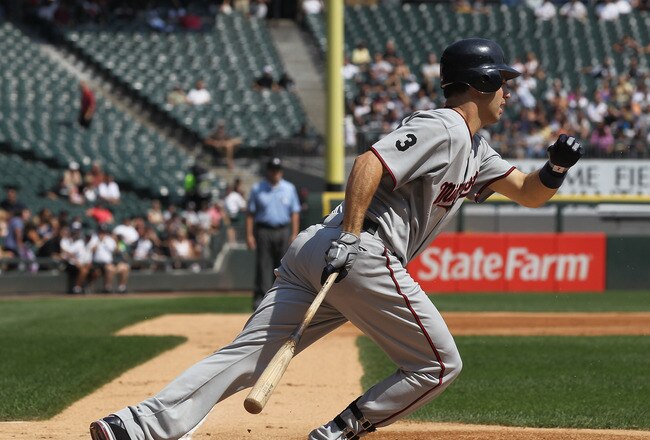 CHICAGO, IL - AUGUST 31:  Joe Mauer #7 of the Minnesota Twins takes a swing against the Chicago White Sox at U.S. Cellular Field on August 31, 2011 in Chicago, Illinois. The Twins defeated the White Sox 7-6.  (Photo by Jonathan Daniel/Getty Images)
