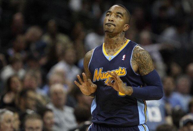 CHARLOTTE, NC - DECEMBER 07:  J.R. Smith #5 of the Denver Nuggets celebrates after making a basket against the Charlotte Bobcats during their game at Time Warner Cable Arena on December 7, 2010 in Charlotte, North Carolina.  NOTE TO USER: User expressly acknowledges and agrees that, by downloading and/or using this Photograph, User is consenting to the terms and conditions of the Getty Images License Agreement.  (Photo by Streeter Lecka/Getty Images)