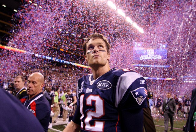 INDIANAPOLIS, IN - FEBRUARY 05:  Tom Brady #12 of the New England Patriots celebrates after losing to the New York Giants by a score of 21-17 in Super Bowl XLVI at Lucas Oil Stadium on February 5, 2012 in Indianapolis, Indiana.  (Photo by Elsa/Getty Images)