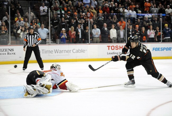 ANAHEIM, CA - FEBRUARY 06:  Niklas Hagman #12 of the Anaheim Ducks scores a goal over Miikka Kiprusoff #34 of the Calgary Flames during the  overtime shootout resulting in a 3-2 win at Honda Center on February 6, 2012 in Anaheim, California.  (Photo by Harry How/Getty Images)