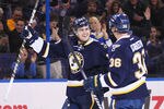 ST. LOUIS, MO - JANUARY 7: Kevin Shattenkirk #22 of the St. Louis Blues celebrates his goal with teammate Matt D'Agostini #36 against the Colorado Avalanche at the Scottrade Center on January 7, 2012 in St. Louis, Missouri.  (Photo by Dilip Vishwanat/Getty Images)