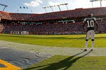 MIAMI GARDENS, FL - JANUARY 01:   Santonio Holmes #10 of the New York Jets looks on during a game against the Miami Dolphins at Sun Life Stadium on January 1, 2012 in Miami Gardens, Florida.  (Photo by Mike Ehrmann/Getty Images)