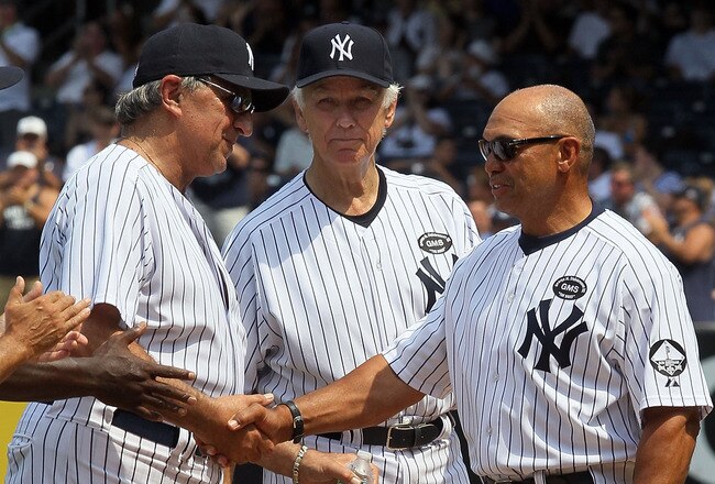 NEW YORK - JULY 17:  Hall of Famer Reggie Jackson shakes hands with Joe Pepitone during the New York Yankees 64th Old-Timer's Day before the MLB game against the Tampa Bay Rays on July 17, 2010 at Yankee Stadium in the Bronx borough of New York City.  (Photo by Jim McIsaac/Getty Images)