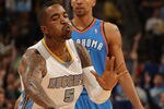 DENVER, CO - APRIL 25:  J.R. Smith #5 of the Denver Nuggets celebrates after hitting a three point basket against the Oklahoma City Thunder in Game Four of the Western Conference Quarterfinals in the 2011 NBA Playoffs at Pepsi Center on April 25, 2011 in Denver, Colorado. NOTE TO USER: User expressly acknowledges and agrees that, by downloading and or using this photograph, User is consenting to the terms and conditions of the Getty Images License Agreement.  (Photo by Justin Edmonds/Getty Images)