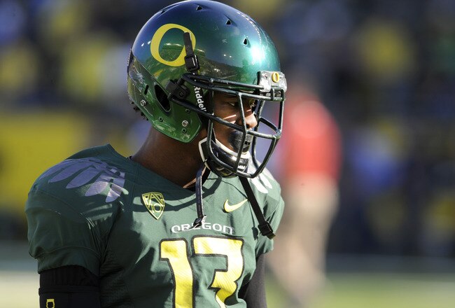 EUGENE, OR - OCTOBER 2: Cornerback Cliff Harris #13 of the Oregon Ducks warms before the start of the game at Autzen Stadium on October 2, 2010 in Eugene, Oregon. Oregon won the game 52-31. (Photo by Steve Dykes/Getty Images)