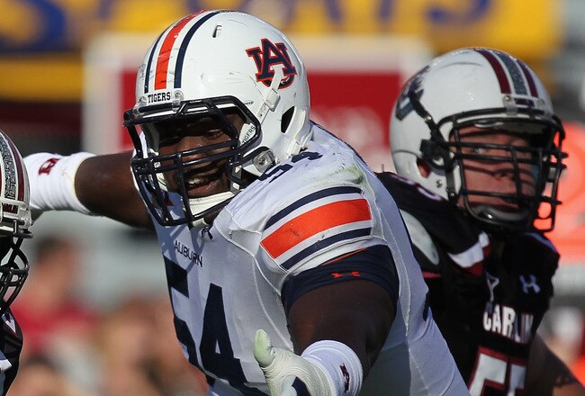 COLUMBIA, SC - OCTOBER 01:  Marcus Lattimore #21 of the South Carolina Gamecocks runs with the ball against Jeffrey Whitaker #54 of the Auburn Tigers during their game at Williams-Brice Stadium on October 1, 2011 in Columbia, South Carolina.  (Photo by Streeter Lecka/Getty Images)