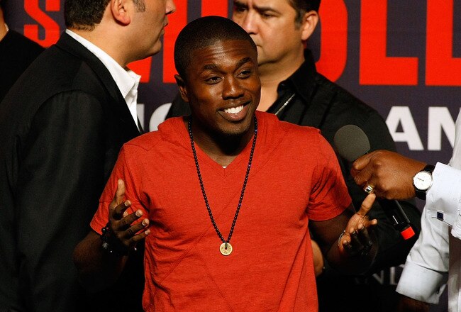LAS VEGAS - APRIL 30:  Boxer Andre Berto reacts to the crowd from the stage before the start of the Floyd Mayweather Jr. and Shane Mosley weigh-in at the MGM Grand Garden Arena on April 30, 2010 in Las Vegas, Nevada. Mayweather and Mosley will meet in a 12-round welterweight bout on May 1, 2010 in Las Vegas.  (Photo by Ethan Miller/Getty Images)