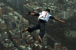 TAIPEI, TAIWAN - DECEMBER 12: (EDITORIAL USE ONLY - NO SALES, NO ARCHIVING) In this handout provided by Euro-Newsroom, a 38-year-old Felix Baumgartner, Austrian base jumper, makes a jump off the world's tallest completed building, the 508-meter high Taipei 101 Tower, December 12, 2007 in Taipei,Taiwan.   (Photo by Joerg Mitter/Euro-Newsroom via Getty Images)