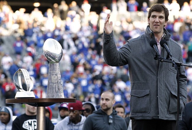 EAST RUTHERFORD, NJ - FEBRUARY 07:  Eli Manning #10 of the New York Giants speaks to fans at a rally to celebrate the New York Giants' Super Bowl victory at MetLife Stadium on February 7, 2012 in East Rutherford, New Jersey. The Giants defeated the New England Patriots 21-17 in Super Bowl XLVI at Lucas Oil Stadium on February 5, 2012 in Indianapolis, Indiana.  (Photo by Jeff Zelevansky/Getty Images)