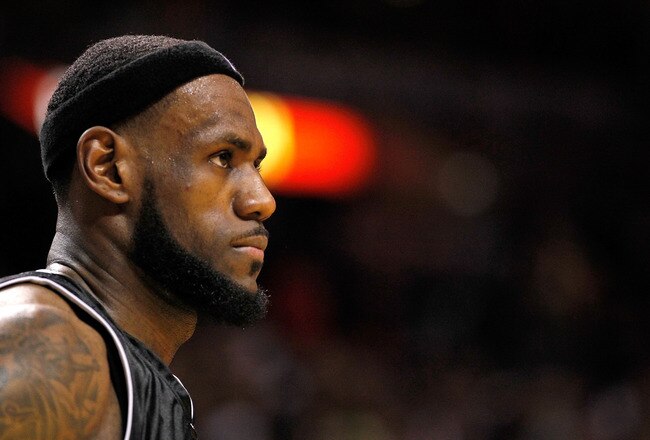 MIAMI, FL - JANUARY 29:  LeBron James #6 of the Miami Heat looks on during a game against the Chicago Bulls at American Airlines Arena on January 29, 2012 in Miami, Florida. NOTE TO USER: User expressly acknowledges and agrees that, by downloading and/or using this Photograph, User is consenting to the terms and conditions of the Getty Images License Agreement.  (Photo by Mike Ehrmann/Getty Images)