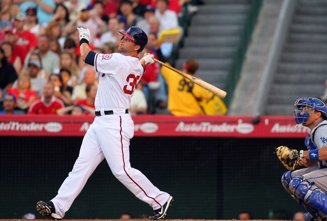 ANAHEIM, CA - JULY 03:  Russell Branyan #39 of the Los Angeles Angels of Anaheim watches his hit go over the right center field wall for a home run during their MLB game against the Los Angeles Dodgers at Angel Stadium of Anaheim on July 3, 2011 in Anaheim, California.  (Photo by Victor Decolongon/Getty Images)