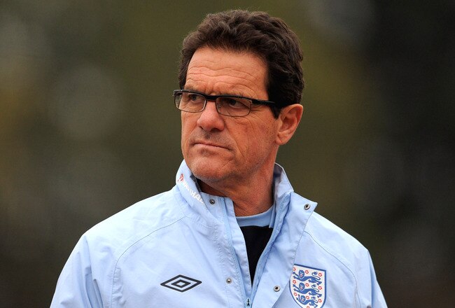 LONDON COLNEY, ENGLAND - NOVEMBER 14:  England manger Fabio Capello looks on during the England training session on November 14, 2011 in London Colney, England.  (Photo by Michael Regan/Getty Images)