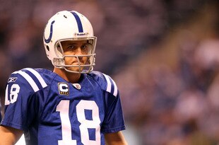INDIANAPOLIS, IN - JANUARY 08:  Quarterback Peyton Manning #18 of the Indianapolis Colts looks on against the New York Jets during their 2011 AFC wild card playoff game at Lucas Oil Stadium on January 8, 2011 in Indianapolis, Indiana. The Jets won 17-16. (Photo by Andy Lyons/Getty Images)