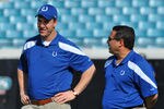 JACKSONVILLE, FL - JANUARY 01: Quarterback Peyton Manning #18 of the Indianapolis Colts talks with offensive coordinator Clyde Christensen before the kickoff against the Jacksonville Jaguars January 1, 2012 at EverBank Field in Jacksonville, Florida.  (Photo by Al Messerschmidt/Getty Images)