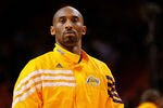 MIAMI, FL - JANUARY 19:  Kobe Bryant #24 of the Los Angeles Lakers looks on during a game against the Miami Heat at American Airlines Arena on January 19, 2012 in Miami, Florida. NOTE TO USER: User expressly acknowledges and agrees that, by downloading and/or using this Photograph, User is consenting to the terms and conditions of the Getty Images License Agreement.  (Photo by Mike Ehrmann/Getty Images)