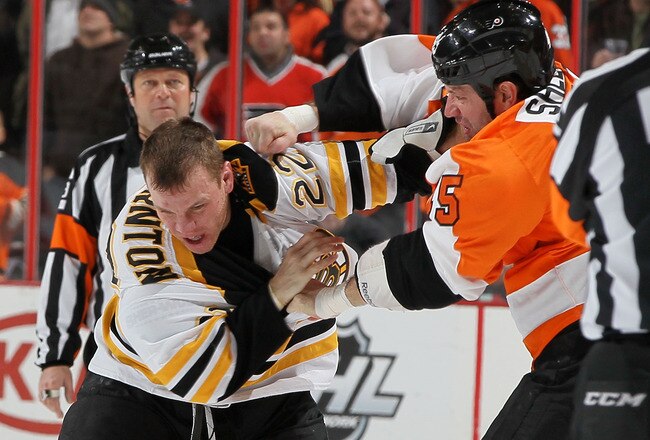 PHILADELPHIA, PA - JANUARY 22:  Shawn Thornton #22 of the Boston Bruins fights Jody Shelley #45 of the Philadelphia Flyers during their game on January 22, 2012 at Wells Fargo Center in Philadelphia, Pennsylvania.  (Photo by Jim McIsaac/Getty Images)