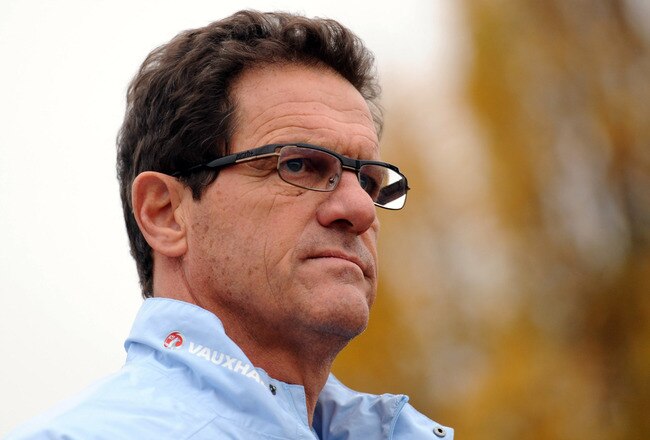 LONDON COLNEY, ENGLAND - NOVEMBER 14: England manger Fabio Capello looks on during the England training session on November 14, 2011 in London Colney, England.  (Photo by Michael Regan/Getty Images)