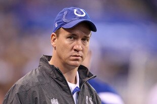 INDIANAPOLIS, IN - NOVEMBER 13:  Peyton Manning of the Indianapolis Colts watches the game action in the Colts 17-3 loss to the Jacksonville Jaguars at Lucas Oil Stadium on November 13, 2011 in Indianapolis, Indiana.  (Photo by Andy Lyons/Getty Images)