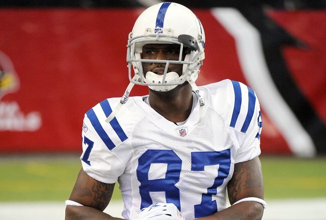 GLENDALE, AZ - SEPTEMBER 27:  Reggie Wayne #87 of the Indianapolis Colts warms up against the Arizona Cardinals before the game at University of Phoenix Stadium on September 27, 2009 in Glendale, Arizona.  (Photo by Harry How/Getty Images)
