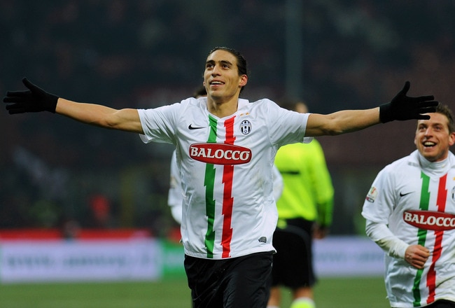 MILAN, ITALY - FEBRUARY 08:  Martin Caceres of Juventus FC celebrates his second goal during the Tim Cup match between AC Milan and Juventus FC at Giuseppe Meazza Stadium on February 8, 2012 in Milan, Italy.  (Photo by Valerio Pennicino/Getty Images)