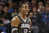 OKLAHOMA CITY, OK - DECEMBER 25:  Dwight Howard #12 of the Orlando Magic questions a call during the NBA season opening game against the Oklahoma City Thunder December 25, 2011 at the Chesapeake Energy Arena in Oklahoma City, Oklahoma.  Oklahoma City defeated Orlando 97-89. NOTE TO USER: User expressly acknowledges and agrees that, by downloading and or using this Photograph, user is consenting to the terms and conditions of the Getty Images License Agreement.  (Photo by Brett Deering/Getty Images)