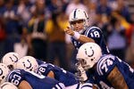 INDIANAPOLIS, IN - JANUARY 08:  Peyton Manning #18 of the Indianapolis Colts gestures a she calls signals out at the line of scrimmage against the New York Jets during their 2011 AFC wild card playoff game at Lucas Oil Stadium on January 8, 2011 in Indianapolis, Indiana. The Jets won 17-16. (Photo by Jonathan Daniel/Getty Images)
