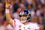 INDIANAPOLIS, IN - FEBRUARY 05:  Eli Manning #10 of the New York Giants reacts against the New England Patriots during Super Bowl XLVI at Lucas Oil Stadium on February 5, 2012 in Indianapolis, Indiana.  (Photo by Jamie Squire/Getty Images)