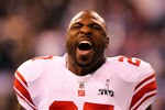 INDIANAPOLIS, IN - FEBRUARY 05:  Brandon Jacobs #27 of the New York Giants screams as he warms up prior to playing the New England Patriots during Super Bowl XLVI at Lucas Oil Stadium on February 5, 2012 in Indianapolis, Indiana.  (Photo by Al Bello/Getty Images)