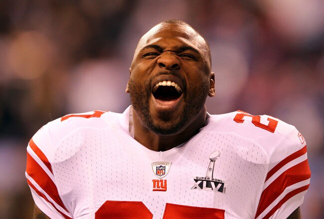 INDIANAPOLIS, IN - FEBRUARY 05:  Brandon Jacobs #27 of the New York Giants screams as he warms up prior to playing the New England Patriots during Super Bowl XLVI at Lucas Oil Stadium on February 5, 2012 in Indianapolis, Indiana.  (Photo by Al Bello/Getty Images)