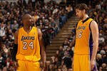 SACRAMENTO, CA - DECEMBER 26:  Kobe Bryant #24 talks to Pau Gasol #16 of the Los Angeles Lakers during their game against the Sacramento Kings at Power Balance Pavilion on December 26, 2011 in Sacramento, California.  NOTE TO USER: User expressly acknowledges and agrees that, by downloading and or using this photograph, User is consenting to the terms and conditions of the Getty Images License Agreement.  (Photo by Ezra Shaw/Getty Images)