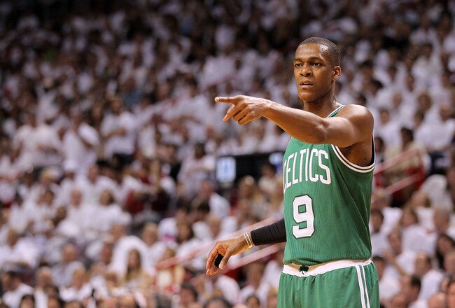 MIAMI, FL - MAY 01:  Rajon Rondo #9  of the Boston Celtics points during Game One of the Eastern Conference Semifinals of the 2011 NBA Playoffs against the Miami Heat at American Airlines Arena on May 1, 2011 in Miami, Florida. NOTE TO USER: User expressly acknowledges and agrees that, by downloading and/or using this Photograph, User is consenting to the terms and conditions of the Getty Images License Agreement.  (Photo by Mike Ehrmann/Getty Images)