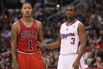 LOS ANGELES, CA - DECEMBER 30: Derrick Rose #1 of the Chicago Bulls and Chris Paul #3 of the Los Angeles Clippers set for a play at Staples Center on December 30, 2011 in Los Angeles, California.   NOTE TO USER: User expressly acknowledges and agrees that, by downloading and or using this photograph, User is consenting to the terms and conditions of the Getty Images License Agreement.  (Photo by Stephen Dunn/Getty Images)
