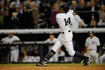 NEW YORK, NY - OCTOBER 06:  Curtis Granderson #14 of the New York Yankees steps up to the plate to bat against the Detroit Tigers during Game Five of the American League Championship Series at Yankee Stadium on October 6, 2011 in the Bronx borough of New York City.  (Photo by Patrick McDermott/Getty Images)