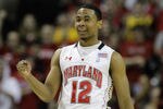 COLLEGE PARK, MD - FEBRUARY 20: Terrell Stoglin #20 of the  Maryland Terrapians celebrates after scoring against the NC State Wolfpack at the Comcast Center on February 20, 2011 in College Park, Maryland.  (Photo by Rob Carr/Getty Images)