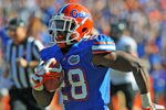 GAINESVILLE, FL -  NOVEMBER 5:  Running back Jeff Demps #28 of the Florida Gators runs for a 52-yard touchdown against the Vanderbilt Commodores November 5, 2011 at Ben Hill Griffin Stadium in Gainesville, Florida.  Demps scored in the second quarter. (Photo by Al Messerschmidt/Getty Images)