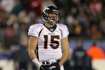 FOXBORO, MA - JANUARY 14:  Tim Tebow #15 of the Denver Broncos looks on against the New England Patriots during their AFC Divisional Playoff Game at Gillette Stadium on January 14, 2012 in Foxboro, Massachusetts.  (Photo by Jim Rogash/Getty Images)