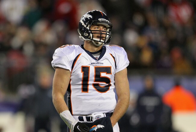 FOXBORO, MA - JANUARY 14:  Tim Tebow #15 of the Denver Broncos looks on against the New England Patriots during their AFC Divisional Playoff Game at Gillette Stadium on January 14, 2012 in Foxboro, Massachusetts.  (Photo by Jim Rogash/Getty Images)