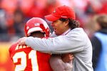 KANSAS CITY, MO - JANUARY 09:  Head coach Todd Haley of the Kansas City Chiefs hugs cornerback Javier Arenas #21 prior to the 2011 AFC wild card playoff game against the Baltimore Ravens at Arrowhead Stadium on January 9, 2011 in Kansas City, Missouri.  (Photo by Dilip Vishwanat/Getty Images)