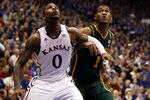LAWRENCE, KS - JANUARY 16:  Thomas Robinson #0 of the Kansas Jayhawks and Perry Jones III #1 of the Baylor Bears box out during the game on January 16, 2012 at Allen Fieldhouse in Lawrence, Kansas.  (Photo by Jamie Squire/Getty Images)