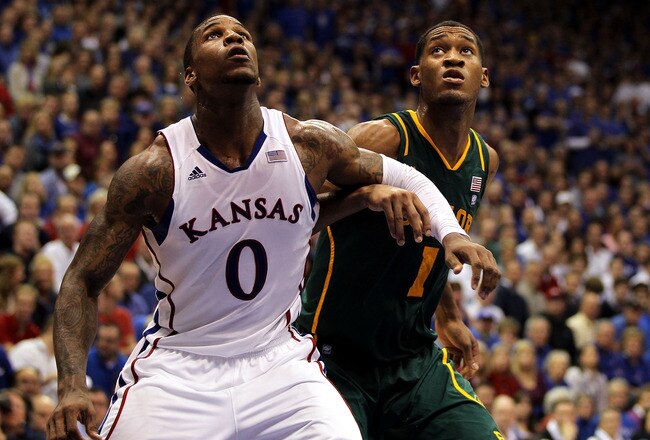 LAWRENCE, KS - JANUARY 16:  Thomas Robinson #0 of the Kansas Jayhawks and Perry Jones III #1 of the Baylor Bears box out during the game on January 16, 2012 at Allen Fieldhouse in Lawrence, Kansas.  (Photo by Jamie Squire/Getty Images)