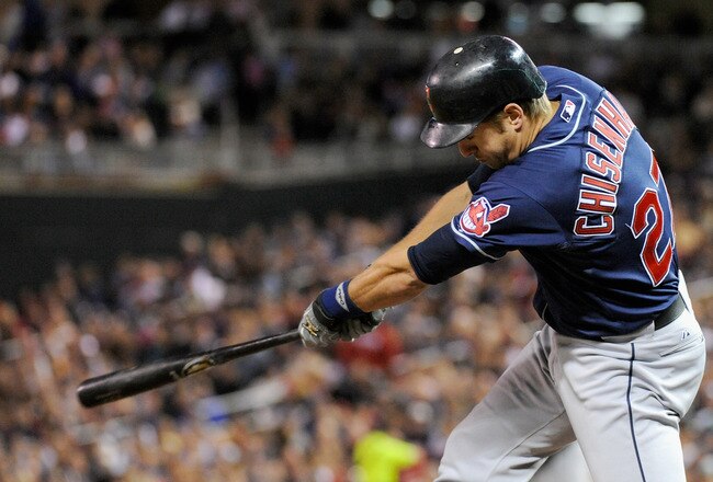 MINNEAPOLIS, MN - SEPTEMBER 16: Lonnie Chisenhall #27 of the Cleveland Indians hits an RBI single against the Minnesota Twins in the fourth inning on September 16, 2011 at Target Field in Minneapolis, Minnesota. (Photo by Hannah Foslien/Getty Images)
