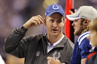 INDIANAPOLIS, IN - DECEMBER 22: Indianapolis Colts quarterback Peyton Manning looks on during the game against the Houston Texans at Lucas Oil Stadium on December 22, 2011 in Indianapolis, Indiana. The Colts defeated the Texans 19-16. (Photo by Joe Robbins/Getty Images)