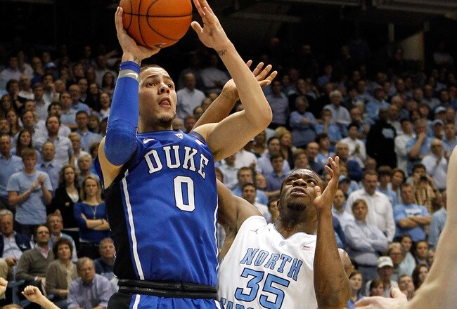 CHAPEL HILL, NC - FEBRUARY 08:  Austin Rivers #0 of the Duke Blue Devils drives to the basket on Reggie Bullock #35 of the North Carolina Tar Heels during their game at the Dean Smith Center on February 8, 2012 in Chapel Hill, North Carolina.  (Photo by Streeter Lecka/Getty Images)