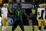 EUGENE, OR - DECEMBER 02:  Josh Huff #1 of the Oregon Ducks celebrates a long kick off return against  the UCLA Bruins  during the Pac 12 Championship Game on December 2, 2011 at the Autzen Stadium in Eugene, Oregon.  (Photo by Jonathan Ferrey/Getty Images)
