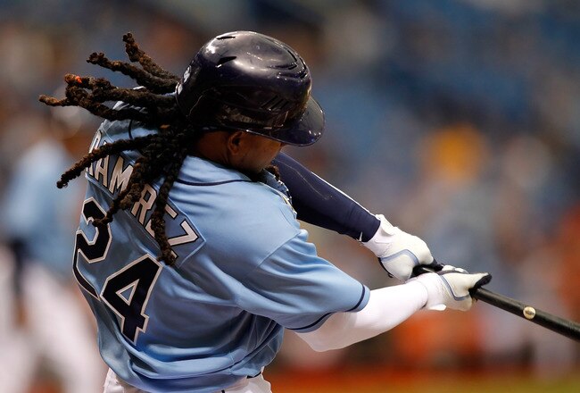 ST. PETERSBURG, FL - APRIL 03:  Designated hitter Manny Ramirez #24 of the Tampa Bay Rays bats against the Baltimore Orioles during the game at Tropicana Field on April 3, 2011 in St. Petersburg, Florida.  (Photo by J. Meric/Getty Images)