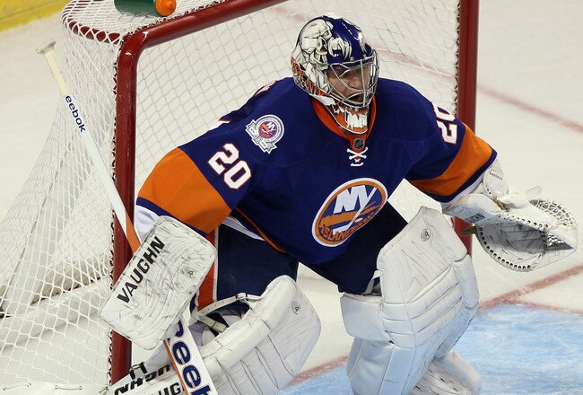 BRIDGEPORT, CT - OCTOBER 01:  Evgeny Nabokov #20 of the New York Islanders skates against the Boston Bruins at the Webster Bank Arena on October 1, 2011 in Bridgeport, Connecticut. The Bruins defeated the Islanders 3-2.  (Photo by Bruce Bennett/Getty Images)
