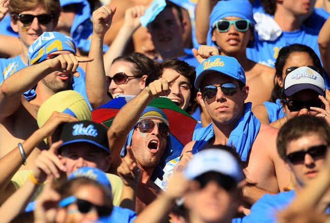 PASADENA, CA - OCTOBER 02:  Fans of the UCLA Bruins cheer on their team as they play the Washington State Cougars at the Rose Bowl on October 2, 2010 in Pasadena, California.  (Photo by Jeff Gross/Getty Images)