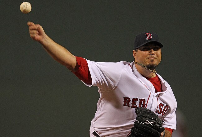 BOSTON, MA - SEPTEMBER 21:  Josh Beckett #19 of the Boston Red Sox throws against the Baltimore Orioles in the 1st inning at Fenway Park September 21, 2011 in Boston, Massachusetts. (Photo by Jim Rogash/Getty Images)